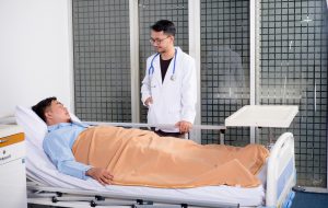 man and doctor in hospital